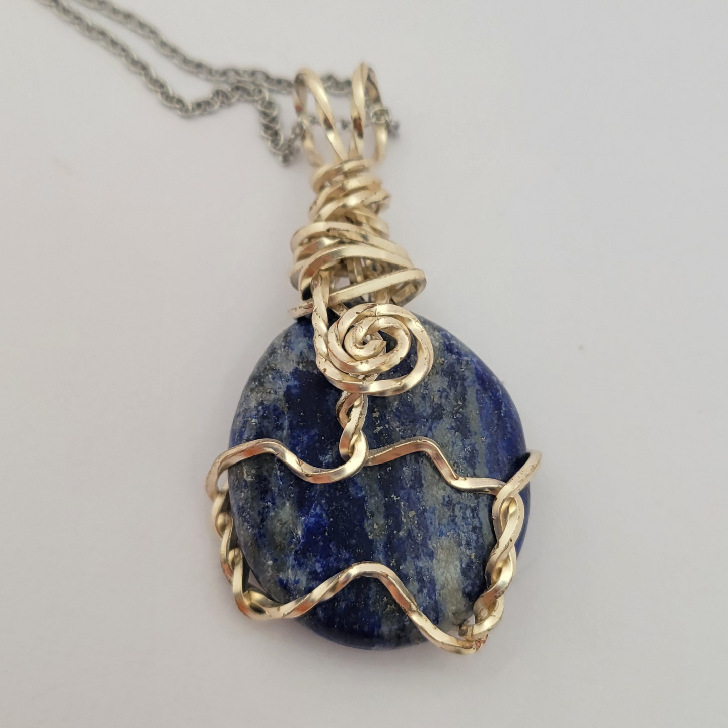 Lapis Lazuli palm stone wire wrap