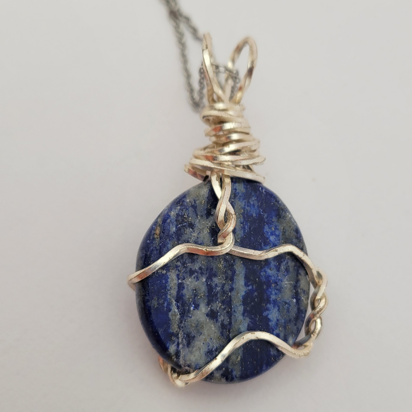 Lapis Lazuli palm stone wire wrap