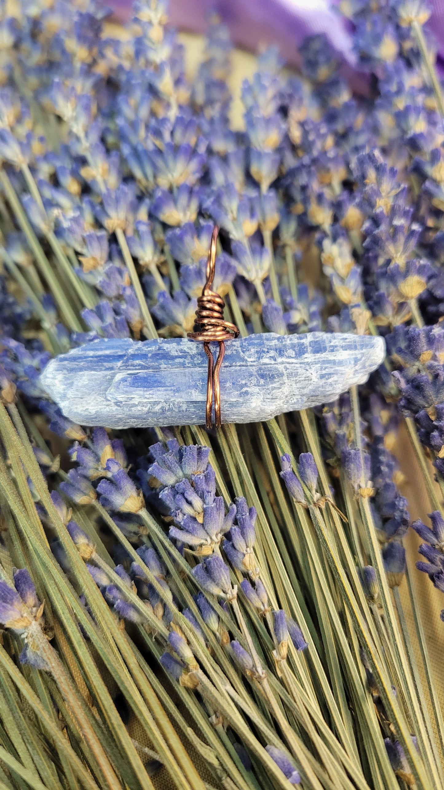 Wire wrapped blue kyanite crystal necklace