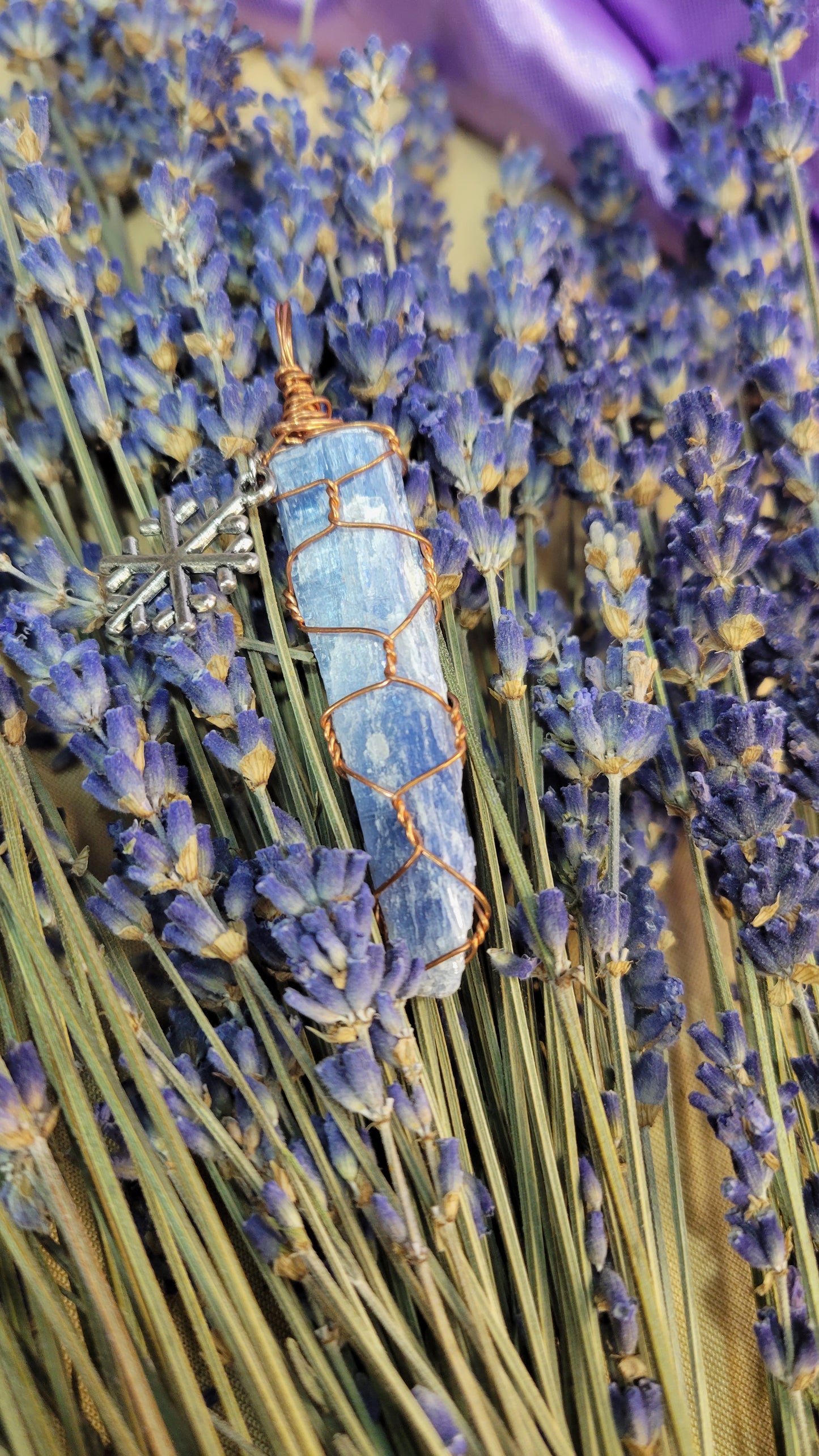 Wire wrapped blue kyanite crystal necklace with snowflake charm