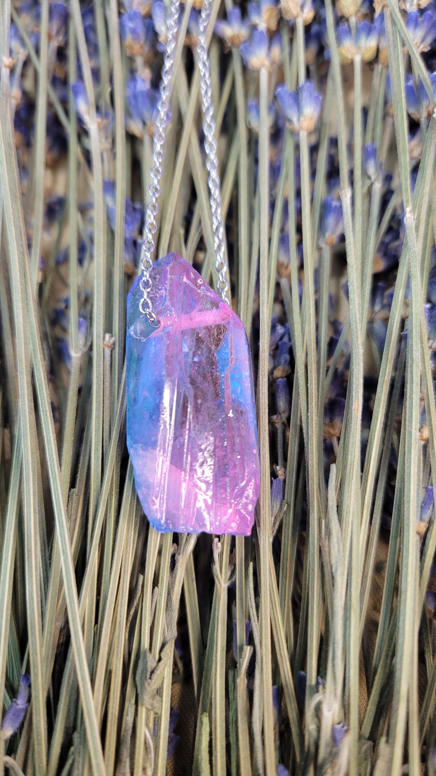 Quartz crystal (artificially colored) crystal strung with simple dainty chain