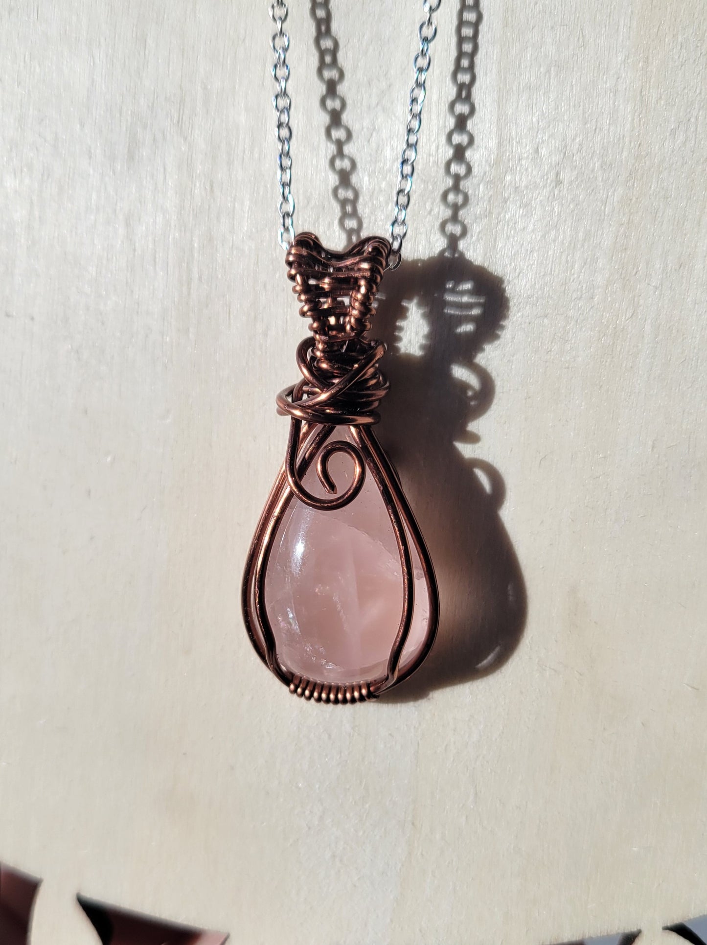 Wire wrapped rose quartz teardrop cabachon