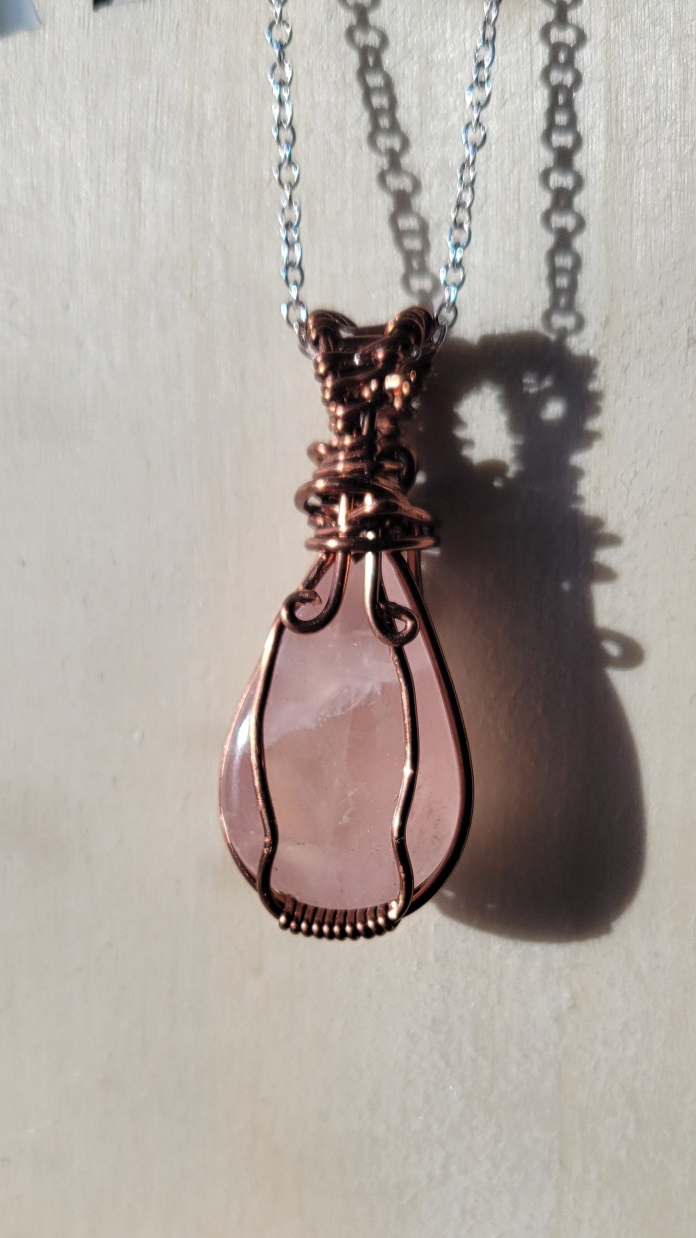 Wire wrapped rose quartz teardrop cabachon