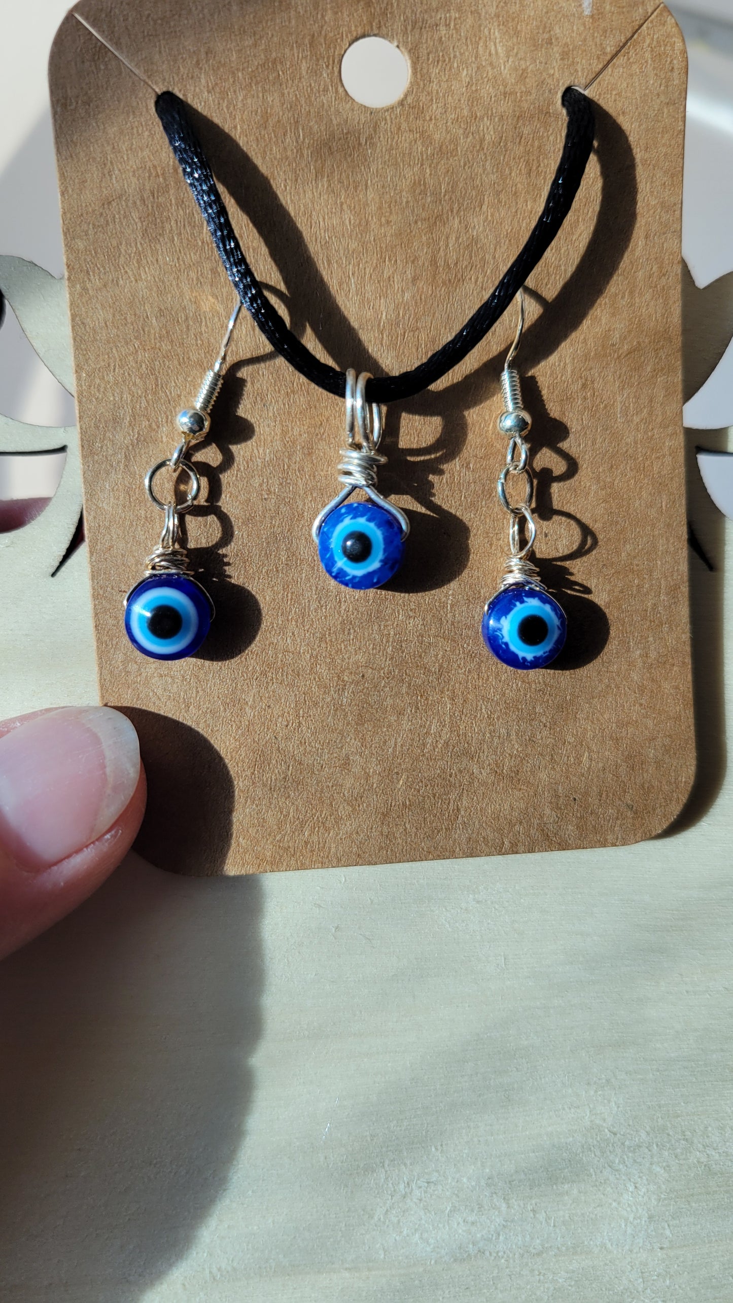 Evil eye necklace and earrings