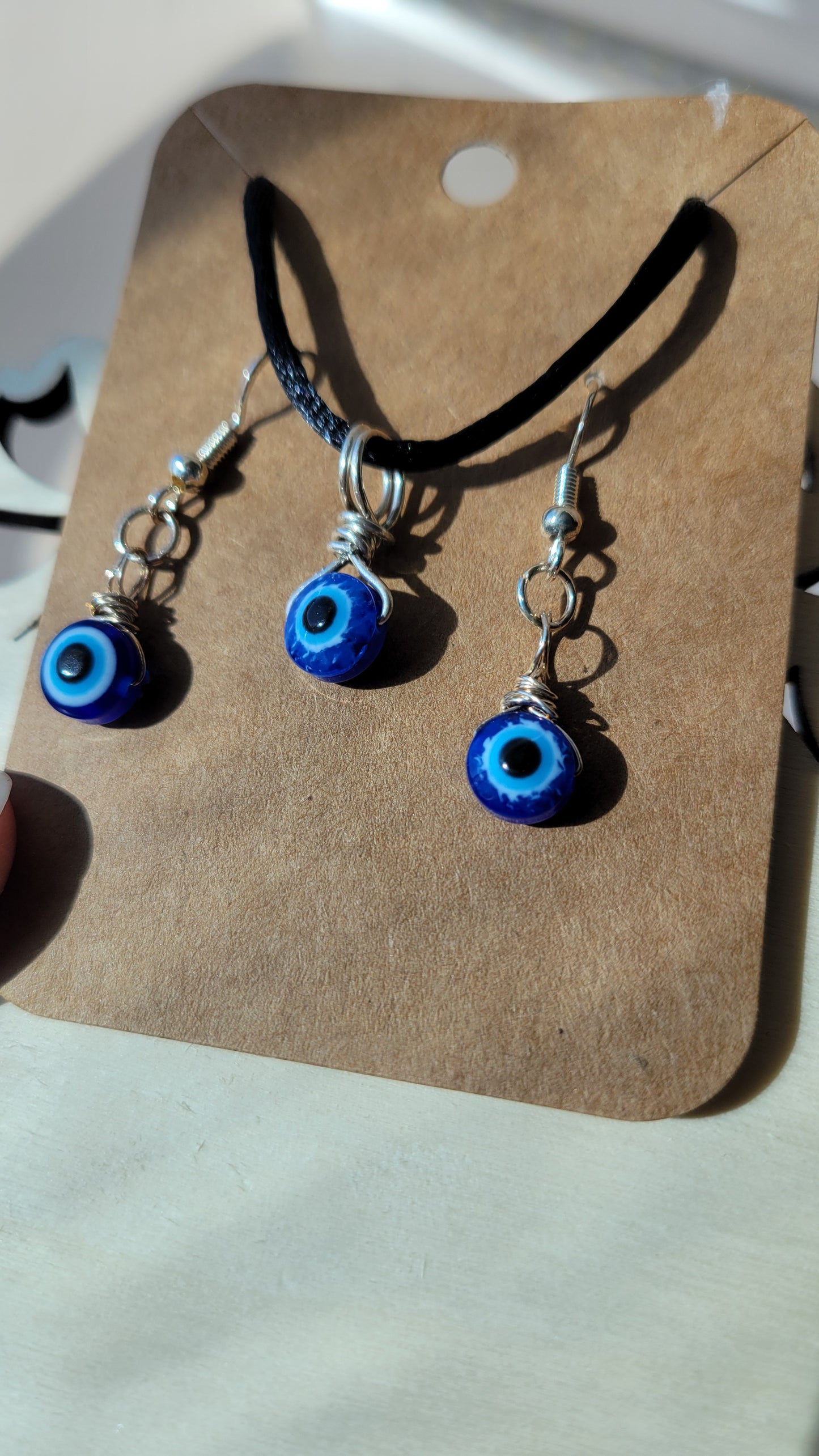 Evil eye necklace and earrings