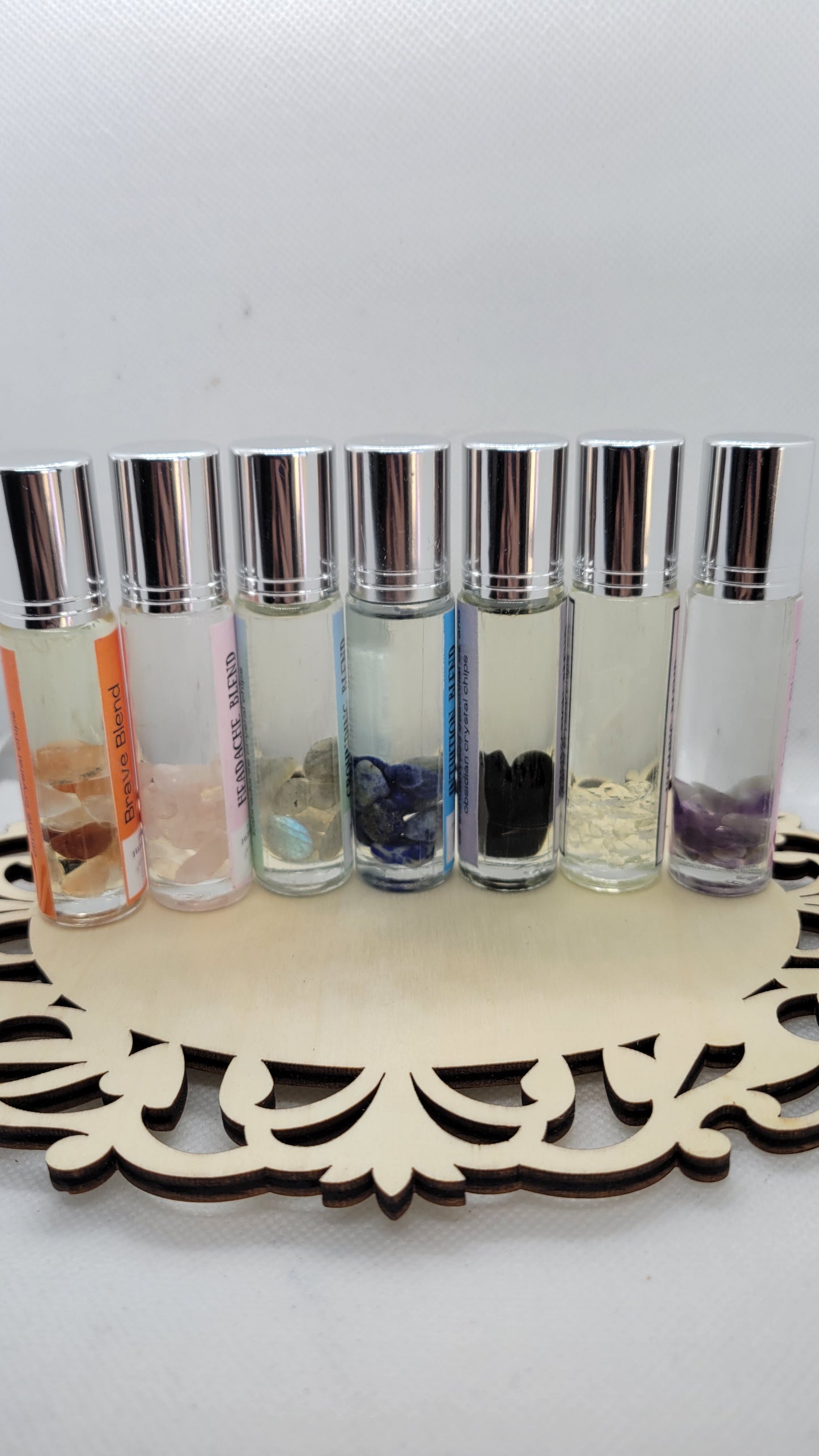 Essential oil roller bottle with crystal chip